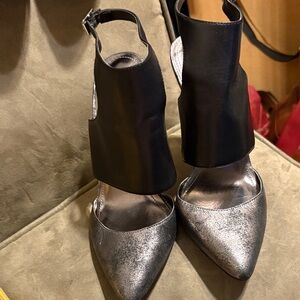 BCBGeneration Black Ankle-Cuff Heels with Silver Pointed Toe